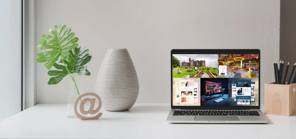 Laptop displaying a selection of modern websites and 3D virtual tours designed by a digital marketing agency