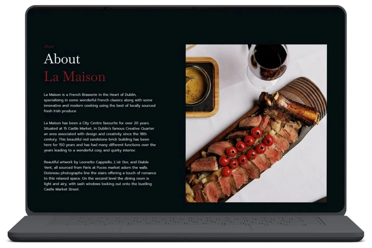 La Maison restaurant about page before website redesign displayed on laptop screen